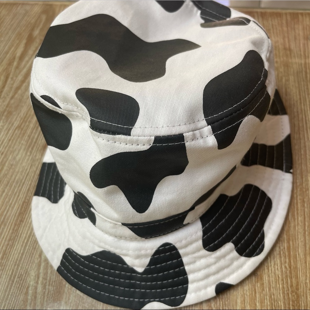 urban outfitters cow print bucket hat